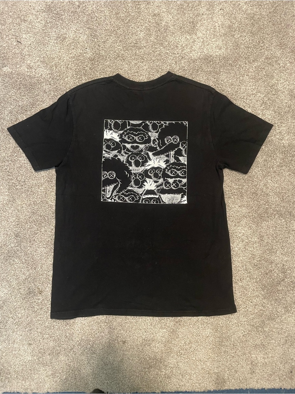 KAWS Black Pocket Tee with White XX Stitch